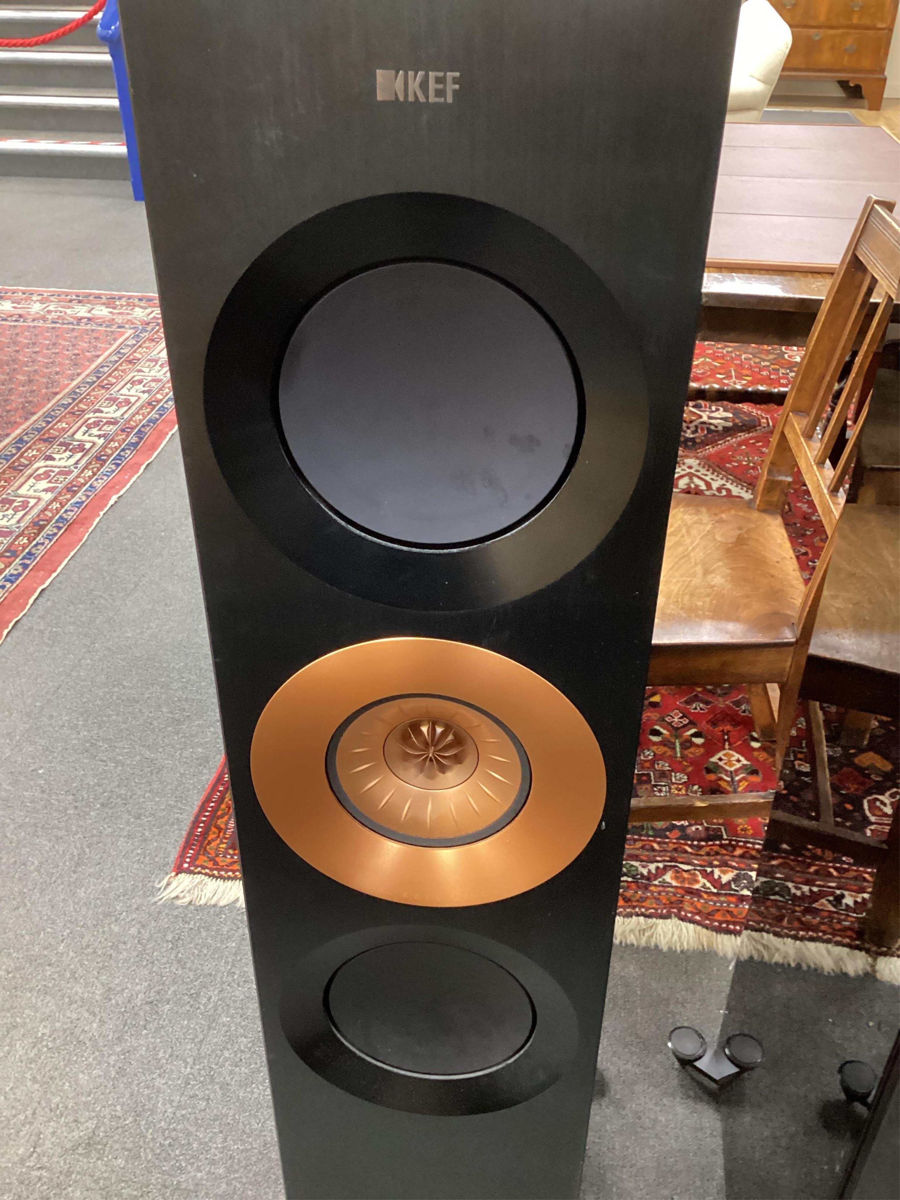 A pair of flooring standing limited edition KEF Reference 3 stereo speakers, the ‘Foundry Edition’, finished in gloss black with copper speaker surrounds on the centre speakers and copper finished plaque to the reverse c